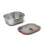 The Black + Blum Steel Food Box, featuring a microwaveable stainless steel body, gray plastic lid, and red silicone valve for leakproof storage, is displayed side by side on a white background.