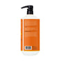 A bottle of Alaffia EveryDay Shea Body Lotion with a black pump, shown from the back. The orange label lists directions, ingredients, and product details in white text—including the addition of fair trade shea butter for nourishing care. A barcode is visible near the bottom.