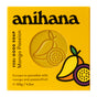 Anihana Feel-Good Soap in a yellow box with mango and passionfruit graphics features a round coconut oil soap visible through a window. Text highlights its tropical scent and weight (120g/4.2oz).