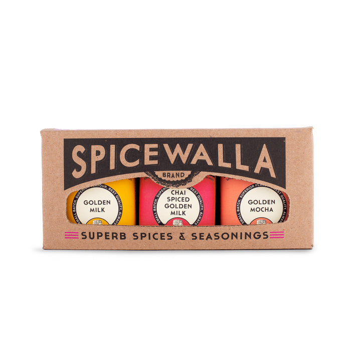 The Spicewalla Golden Milk Collection gift box includes three spice tins—Golden Milk, Chai Spiced Golden Milk, and Golden Mocha—with Superb Spices & Seasonings on the box.
