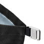 Close-up of a Black + Blum Lunch Bag corner with a silver metal hook on a fabric loop. The hook is engraved with the brand name, and the inside lining is light gray—ideal for carrying lunch or snacks on the go.