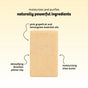 Experience the Sunniemade Moisturizing Hand & Body Bar Soap – Main Squeeze: a beige bar infused with pink grapefruit and lemongrass essential oils, detoxifying Brazilian yellow clay, and nourishing shea butter. Labeled ingredients highlight its naturally powerful formula that moisturizes and purifies. This grapefruit lemongrass soap is an ideal addition to your natural body care routine.