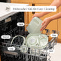 A person loads labeled parts—tank, tray, cap, spacer, and grill—of the Canopy Nursery Humidifier into a dishwasher rack beneath the text: “Dishwasher Safe for Easy Cleaning.”.