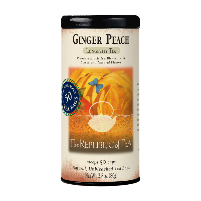 A cylindrical container of The Republic of Tea Ginger Peach Black Tea, featuring peaches and a butterfly, includes 50 unbleached tea bags (net wt 2.8 oz/80g). Enjoy natural peach and ginger flavors for digestion support.