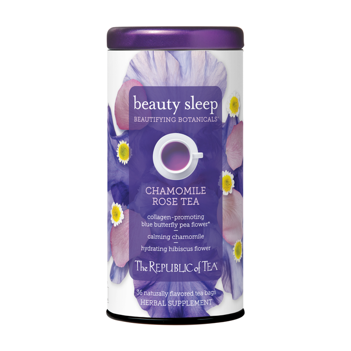A canister of Beauty Sleep Tea by The Republic of Tea, adorned with floral artwork and product details promoting its calming skin benefits, features a white teacup icon at the center.
