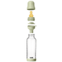 An exploded view of the BIBS Glass Baby Bottle with Natural Rubber Nipple Complete Set - 0+ Months shows separated components: green cap, yellow anti-colic nipple, green collar, sealing disc, funnel, and clear bottle with markings.