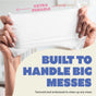 Two hands stretch a textured white DYPER Baby Wipe for Sensitive Skin, with a pink arrow and “EXTRA DURABLE” above. Bold blue text reads, “BUILT TO HANDLE BIG MESSES.” Small text: “Textured, embossed, and plant-based tough.”.