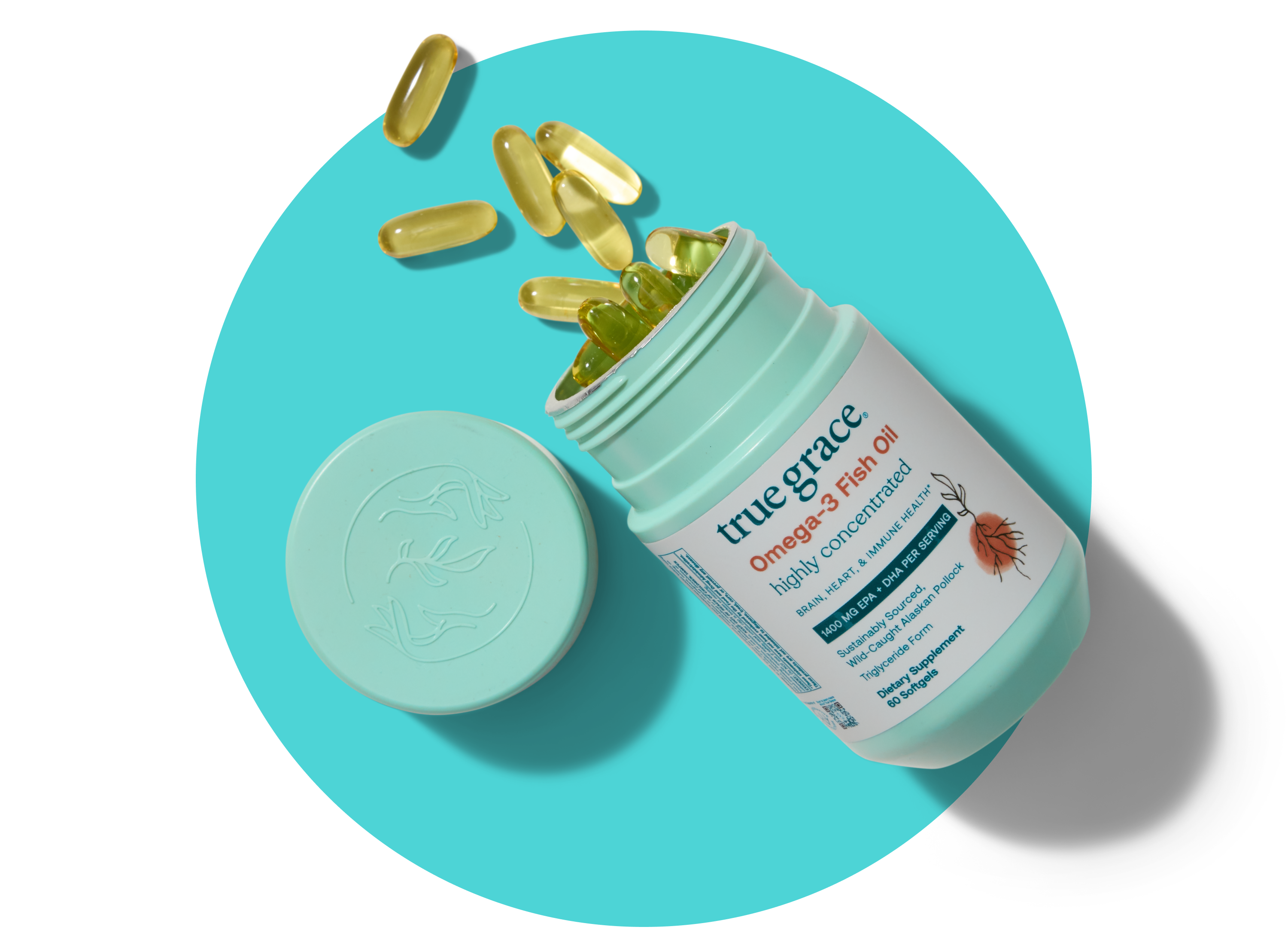 A light blue container labeled true grace Omega-3 fish oil spills several yellow softgel capsules onto a turquoise circular background. The container lid lies nearby, displaying an embossed trident and fish design.