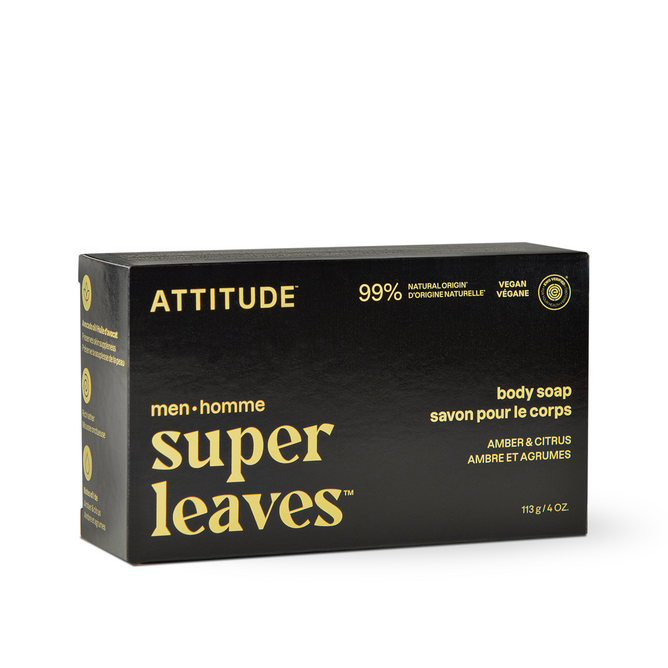 A black rectangular box of ATTITUDE super leaves men Body soap, EWG Verified, vegan, 99% natural origin with an amber & citrus scent. Bilingual English/French on plastic-free packaging. Net weight: 113g (4 oz).