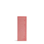 A pink box of ATTITUDE Oceanly Lip Gloss is shown from the back, with vegan ingredients listed in white text covering most of the box, highlighting its plant-based formula. The background is white.