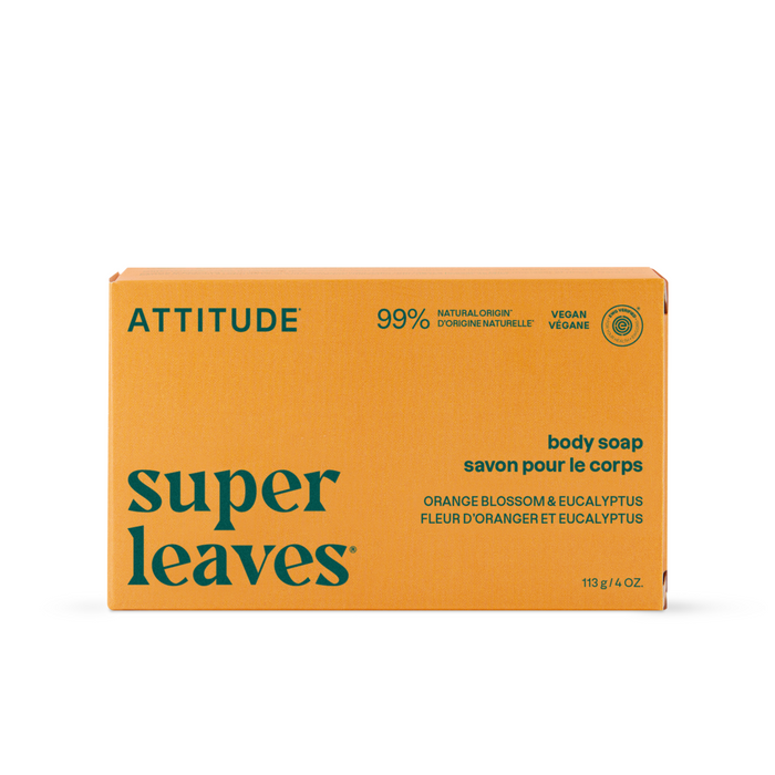 A rectangular orange box of ATTITUDE super leaves Body Soap in orange blossom and eucalyptus scent. This vegan soap features green text, is plastic-free, and contains 99% naturally derived ingredients.