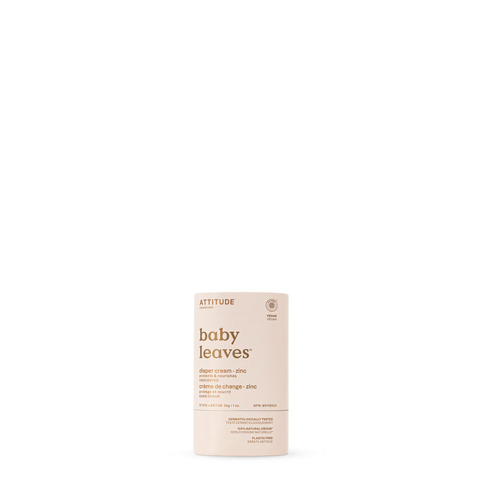 A cylindrical container of ATTITUDE baby leaves Diaper Cream stands upright on a white background. The light beige packaging displays minimalist text about the product’s natural ingredients.
