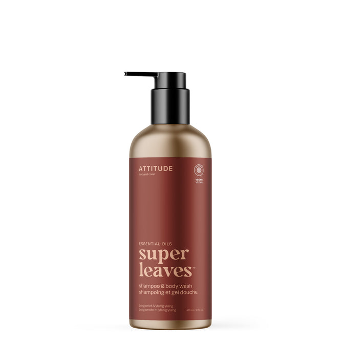 A brown pump bottle of ATTITUDE super leaves 2in1 Shampoo & Body Wash features white and gold text and a black pump, shown on a white background.