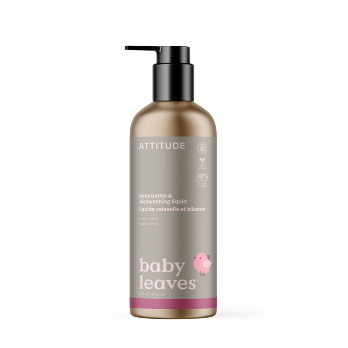 A bottle of ATTITUDE baby home essentials Baby Bottle & Dishwashing Liquid features a pump, an EWG VERIFIED® unscented formula, 98% natural origin content, and a label with a pink bird illustration.