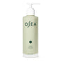 A pale green bottle of OSEA Ocean Cleanser with a white pump, featuring minimalist dark green text and logo on the front.