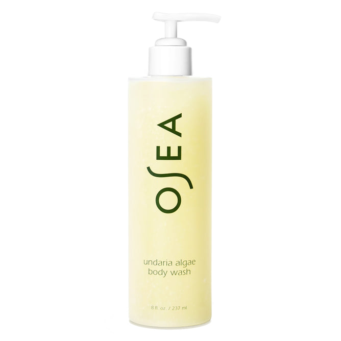 A pump bottle of OSEA Undaria Algae™ Body Wash with a pH-balanced, light yellow liquid. The label displays 