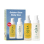 OSEA Golden Glow Body Duo Gift Set with seaweed body oil and anti-aging body balm, shown next to its box featuring an Allure Beauty award. Perfect for glowing skin. White background.