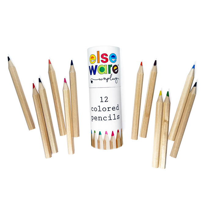 A set of 12 Elseware Unplug Colored Pencils – Travel Size, each with a different color tip, arranged around a white cylindrical box—perfect compact art supplies for creativity anywhere.