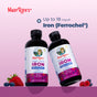 Two bottles of MaryRuth’s Vegan Liquid Iron are displayed on a purple surface with a pink background, accompanied by berries. Text highlights that each serving provides up to 18mg of Ferrochel Iron to support overall health, energy metabolism, and blood health.