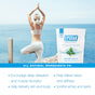 A woman practices yoga by the ocean in white activewear, with a bag of San Francisco Salt Co Epsom Salts - Everyday Muscle Soak in the foreground. Text highlights relaxation, stress relief, detox, and relief from aches.