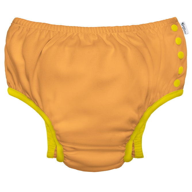 The Green Sprouts Eco Snap Swim Diaper, for 18-month-olds (22-25 lbs), is made from recycled polyester. It features orange and yellow accents with side buttons, offering soft and stretchy fabric for comfort, providing an eco-friendly alternative to traditional swim diapers.