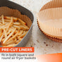 A close-up of crispy French fries in a square air fryer basket lined with Full Circle FSC Certified Air Fryer Liners. Stacked square and round liners nearby—essential accessories for mess-free cooking.