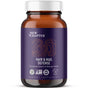 A brown bottle labeled Hair & Nail Defense Capsules - with Biotin for Healthy Hair Growth by New Chapter, featuring purple and white text, certification logos, and 30 capsules of fermented biotin, keratin, and beauty herbs.