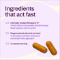 Two orange Drug-Free Pain Relief Capsules - for Aches, Soreness & Discomfort by New Chapter shown on a purple and cream backdrop, featuring Rhuleave-K, regeneratively farmed turmeric, and a two-capsule serving size.