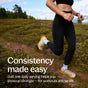 A woman in athletic wear runs on a lush mountain trail. Text: Boost your strength daily with New Chapter Creatine Complex Powder with Magnesium and Plant Based Calcium formulated for Women 40+. Consistency made easy!.