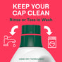A bottle with a green cap on a red background features text: KEEP YOUR CAP CLEAN. Faucet and washing machine icons lead to the cap. Additional text: Rinse or Toss in Wash with our Seventh Generation Concentrated Laundry Detergent and HAND DRY THOROUGHLY.