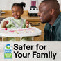 In a kitchen, an adult smiles at a toddler in a high chair playing with food. The text reads Safer for Your Family, promoting Seventh Generations All Purpose Cleaner, featuring plant-derived agents ideal for all surfaces. The scene includes the Safer Choice logo and EPA details.