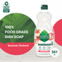 The image displays a 561 ml bottle of Seventh Generation Dish Soap, Summer Orchard edition. Its a dye-free, 100% Food Grade soap featuring the Safer Choice logo against a vibrant green and red background.