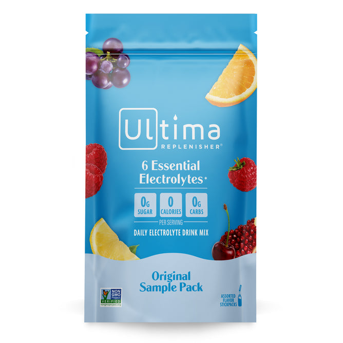 A blue pouch of Ultima Replenisher Electrolyte Drink Mix - Sample shows grapes, orange, raspberries, and pomegranate, highlighting this sugar-free mix with 6 key electrolytes—0g sugar, 0 calories, and 0g carbs per serving.
