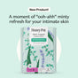A package of HoneyPot Menstrual Pads - Herbal-Infused 100% Organic Cotton Cover is displayed against a light background, accented with illustrations of mint, aloe, and lavender. The text highlights a refreshingly minty sensation for intimate skin, emphasizing the soothing benefits these herbal-infused sanitary pads provide, thanks to their gentle organic cotton cover designed for comfortable menstrual care.
