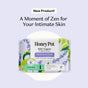 A package of The Honeypot Company 100% Organic Cotton Cover Calming Herbal Infusion Long Liners is shown, offering leak-proof protection and herbal comfort—“A Moment of Zen for Your Intimate Skin.”.