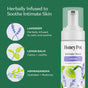 A bottle of HoneyPot Calming Intimate Wash - Herbal Infusion, featuring text that highlights its soothing ingredients—lavender (soothes), lemon balm (calms and uplifts), and ashwagandha (hydrates and restores)—alongside charming illustrations of each plant, making it your essential herbal wash for gentle, calming intimate care.