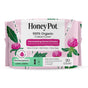 A package of HoneyPot Peri-menopause Long Liners - Harmonizing Herbal Infusion, designed with a gentle organic cotton cover and adorned with pink flowers and green leaves. These hormone balance-friendly liners are free from synthetic fragrances, pesticides, and chlorine, offering gentle care during perimenopause. Each pack contains 30 liners crafted for comfort throughout your transitional journey.