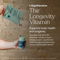 A hand pours capsules from a True Grace Daily Men’s 50+ Multivitamin pouch into another hand with the container, highlighting L-Ergothioneine as The Longevity Vitamin for memory and longevity support in men 50+ multivitamins.