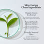 A green tea leaf in a glass dish highlights RMS Beauty Eyelights Cream Eyeshadow, featuring clean ingredients: organic green tea extract, natural peptide quinoa extract, and ethically sourced mica for luminous metallic shades.