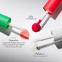 The Mini Lip Oil Trio by RMS Beauty: green tube (Chameleon, pale pink), red tube (Lily, cherry red), and white tube (Adrianna, clear shimmer) are swatched on a light background.