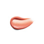 A smooth, glossy smear of peach-colored Legendary Lip Oil by RMS Beauty on a white background, crafted with clean ingredients.