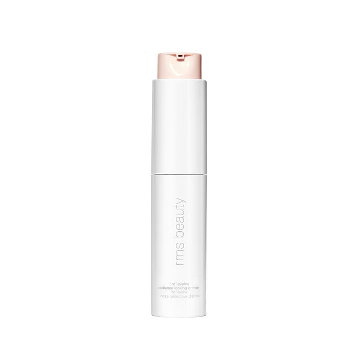 A white bottle of RMS Beauty ReEvolve Radiance Locking Primer, featuring a refillable design and beige pump dispenser, stands upright against a plain white background.