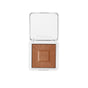 RMS Beauty’s ReDimension Hydra Bronzer is a compact, talc-free bronzer with a sunburst pattern and RMS logo embossed on the powder, housed in a white square refillable compact with an open lid.