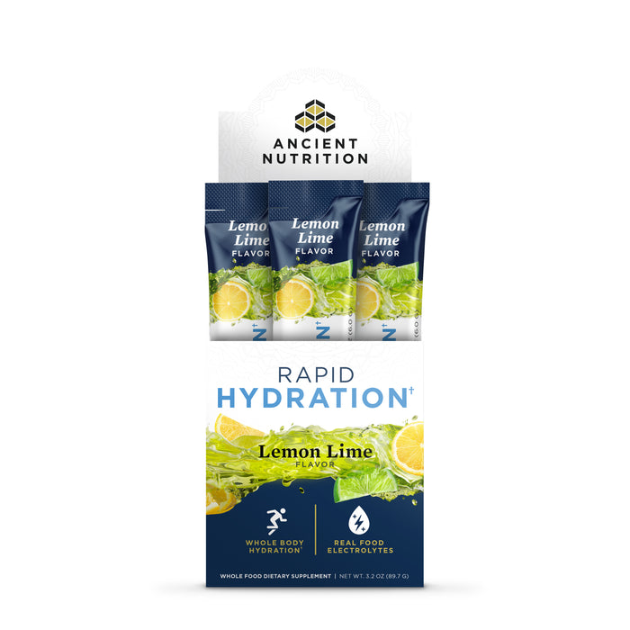 A 3.2 oz box of Ancient Nutrition Hydration Powder in Lemon Lime flavor features real food electrolytes and coconut water, with packaging adorned with vibrant lemons and limes, promoting whole-body hydration for a refreshing experience.