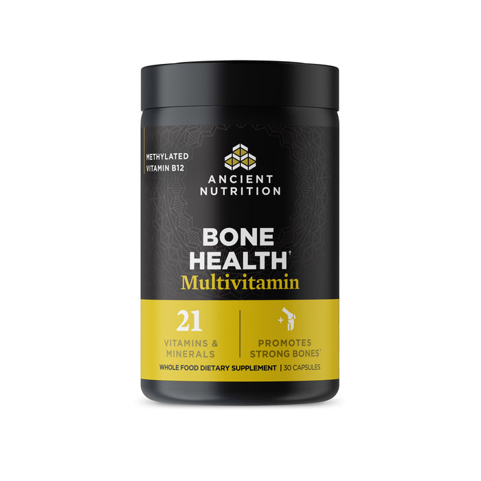 A black and yellow jar labeled Ancient Nutrition Ancient Multi Bone Health Capsules, a dietary supplement with 21 vitamins and minerals for strong bones, containing 30 capsules.