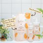 Babo Botanicals Sensitive Baby Baby Shampoo & Wash bottles and a 32 oz refill pouch are shown alongside plants, underscoring their gentle, plant-based ingredients. The display emphasizes eco-friendly benefits—refill your bottles with the larger pouch to save money and reduce plastic waste—making this cleanser from Babo Botanicals a smart choice for delicate skin.