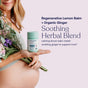 A pregnant woman holds a jar of True Grace Prenatal Multivitamin Tablets against her belly with green leaves, highlighting a calming blend of lemon balm, ginger, and vitamin D3 to support a healthy mom and baby.