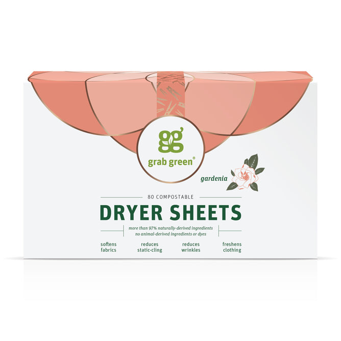 A box of Classic Dryer Sheets - Gardenia - NEW by grab green contains 80 sheets in light green, floral-designed packaging with a pink tab, highlighting its static cling reduction and clothes softening abilities while freshening. Plus, the package is compostable!.