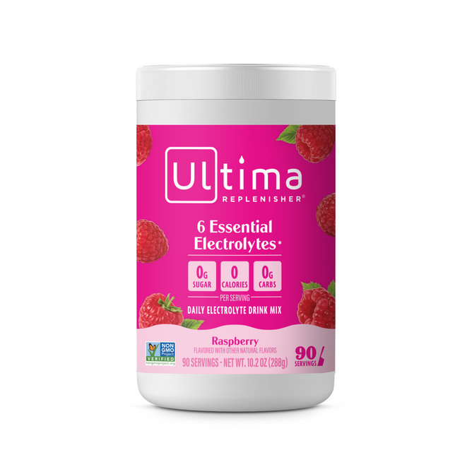 A container of Ultima Replenisher Broad Spectrum Electrolyte Mix for Hydration features raspberry images on a pink background, highlighting sugar-free hydration, 6 essential electrolytes, 0g sugar, 0 calories, and 0g carbs per serving.