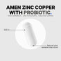 A white capsule pill is centered on a light background with text: Codeage Amen Zinc Copper with Probiotics, and labels showing the capsule is 0.82 inches long; its natural color may vary.